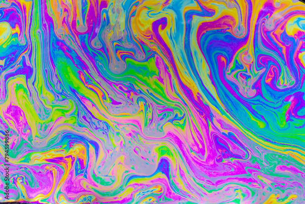 Wall mural psychedelic multicolored background abstract. rainbow colors. patterns background. photo macro shot 
