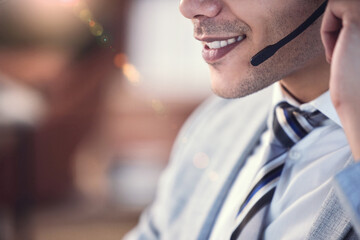 Face, man and happy as employee at call center with customer or client support and service. Male...