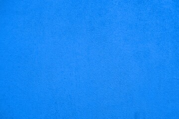 Empty blue stucco wall texture for background