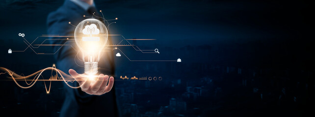 Web Hosting: Businessman Holding Creative Light Bulb with Digital Networking and Web Hosting Icon. Innovation, Connectivity, Advancing Online Presence, on Blue City Background.