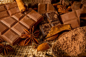 Closeup of various types of chocolate with spices