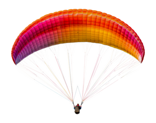 Colorful paraglider soaring
