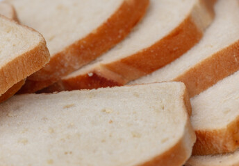 Close up of heap of sliced bread. Concept of everyday living.