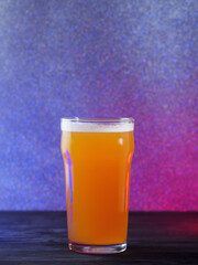 Craft beer ipa glass on neon background