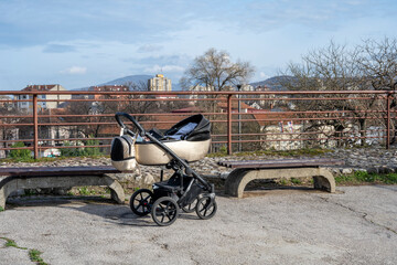 Empty baby strollers for boys and girls in the park.
