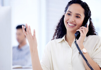 Receptionist, woman and smile with telephone in office for customer service, administration and...
