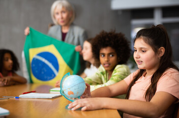 Kids learning together about brazil in geography class