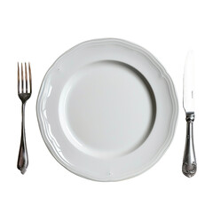 A stark white plate accompanied by a fork and knife rests elegantly on a rich dark wooden table in a striking contrast against a transparent background
