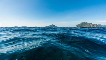 Fototapeta na wymiar close up blue water surface at deep ocean