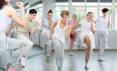 Group of children boys and girls dance dancehall in studio