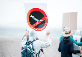 Covid, human rights and protest with people outdoor for demonstration or political rally. Freedom,...