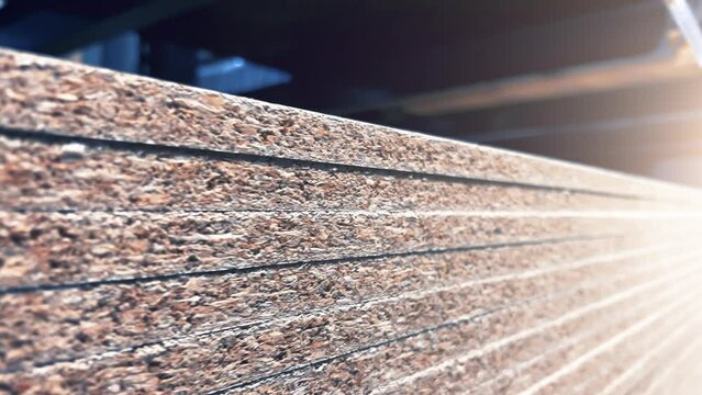 Sheets of Chipboard Stacked in Woodworking Factory or Hardware Store Warehouse