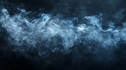 Ethereal blue smoke floating against a dark background creating a sense of mystique and tranquility. 