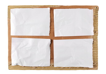 White torn paper on cardboard board isolated 