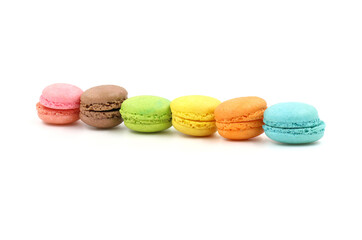 Sweet colorful macarons isolated on white background. Tasty colourful macaroons.