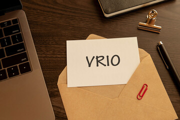 There is word card with the word VRIO. It is an abbreviation for Value, Rarity, Inimitability, Organization as eye-catching image.