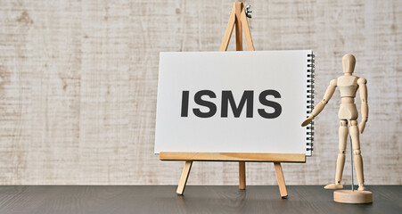 There is notebook with the word ISMS. It is as an eye-catching image.