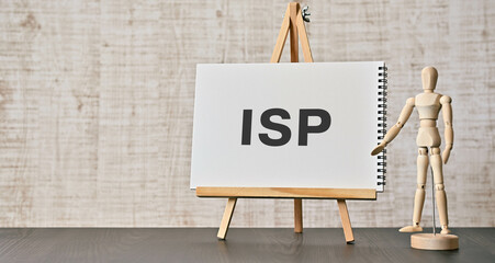 There is notebook with the word ISP. It is an abbreviation for Internet Service Provider as eye-catching image.