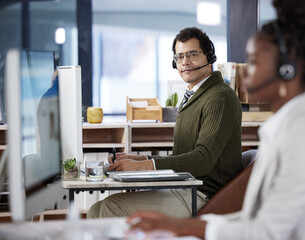 Call center, man and smile with portrait in office for customer service, communication or...