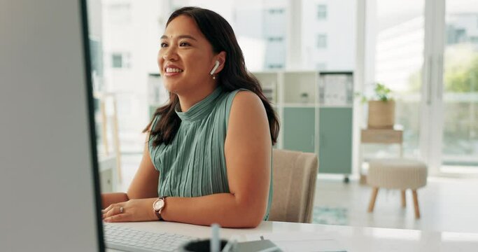 Woman, office and happy on computer at desk as graphic designer with plan, designs and ideas for project in startup business. Female employee, music and internet research or online on website