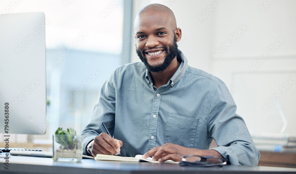 Poster businessman, desk and notebook in portrait with smile in office with planning for creative project. 