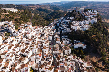 Scenic aerial view of small mountain Spanish village of Casares with Moorish cliff-hugging buildings