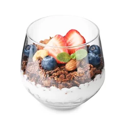 Raamstickers Tasty granola with berries, nuts and yogurt in glass isolated on white © New Africa