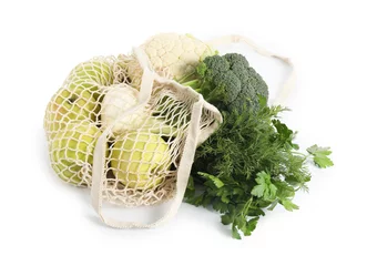 Foto op Plexiglas Fresh products in string bag isolated on white © New Africa