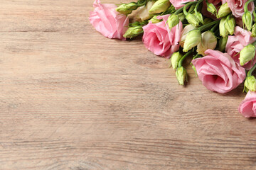 Happy Mother's Day. Beautiful flowers on wooden table, space for text