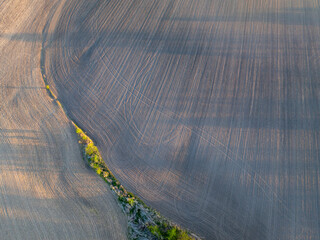 springtime aerial view of plowed corn fields in central Missouri - 794583671