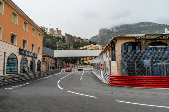 La Rascasse curve of the Monaco Formula 1 circuit, open to traffic, with the race fences mounted and the bar of the same name inside.
