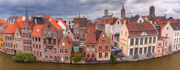 Panoramic aerial view of quay Graslei, Leie river and towers of Old Town, Ghent, Belgium