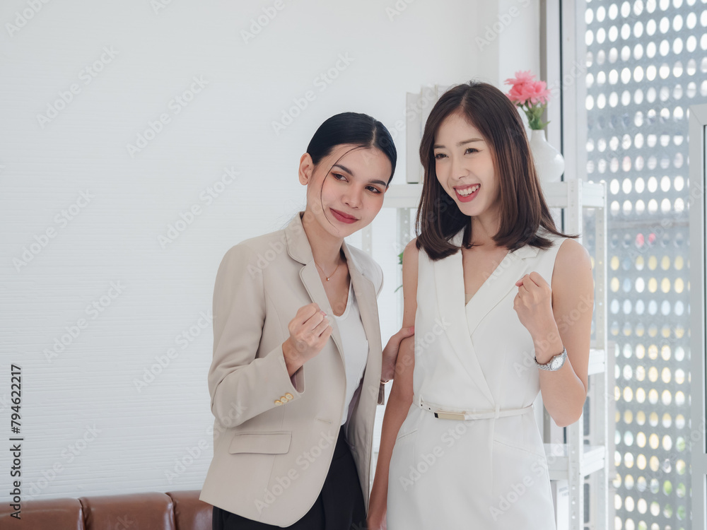 Wall mural portrait business team two woman asian beautiful group standing smile cheerful look on wall white lo