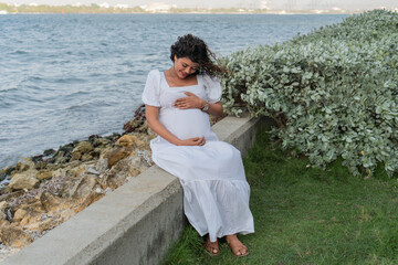 Serene Pregnant Woman by the Sea