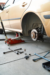 Modern Vehicle and the Floor Jack Lift Vehicle Servicing
