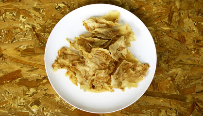 Peyek ebi or shrimp crackers. Crispy and delicious snack from Indonesia.