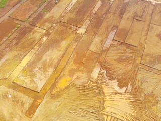 Land leveled for public houses. Aerial drone view of Housing development on the edge of the city. View from above, Housing Industry. Above. Social issues. Shot from drone flying 100 meters