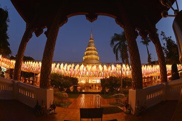 Evening time of Hundred Thousand Lantern Festival at Wat Phra That Hariphunchai. It is an offering...