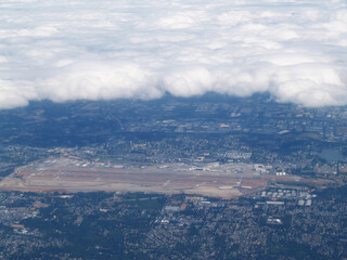 Aerial View Of Aiport And Surrounding Area With Cloud Cover