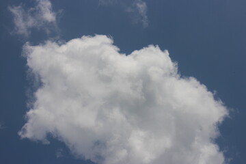 blue sky and white clouds. Freshness of the new day. Bright blue background.