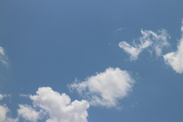 White clouds in a blue sky