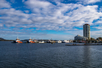 Beautiful Nanaimo city skyline. Multi-storey buildings and a marina for boats and yachts in the bay...