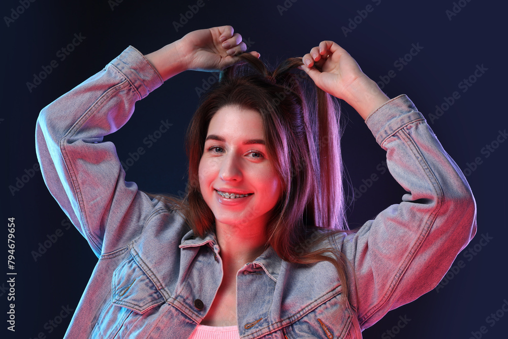 Poster Portrait of beautiful young woman on color background