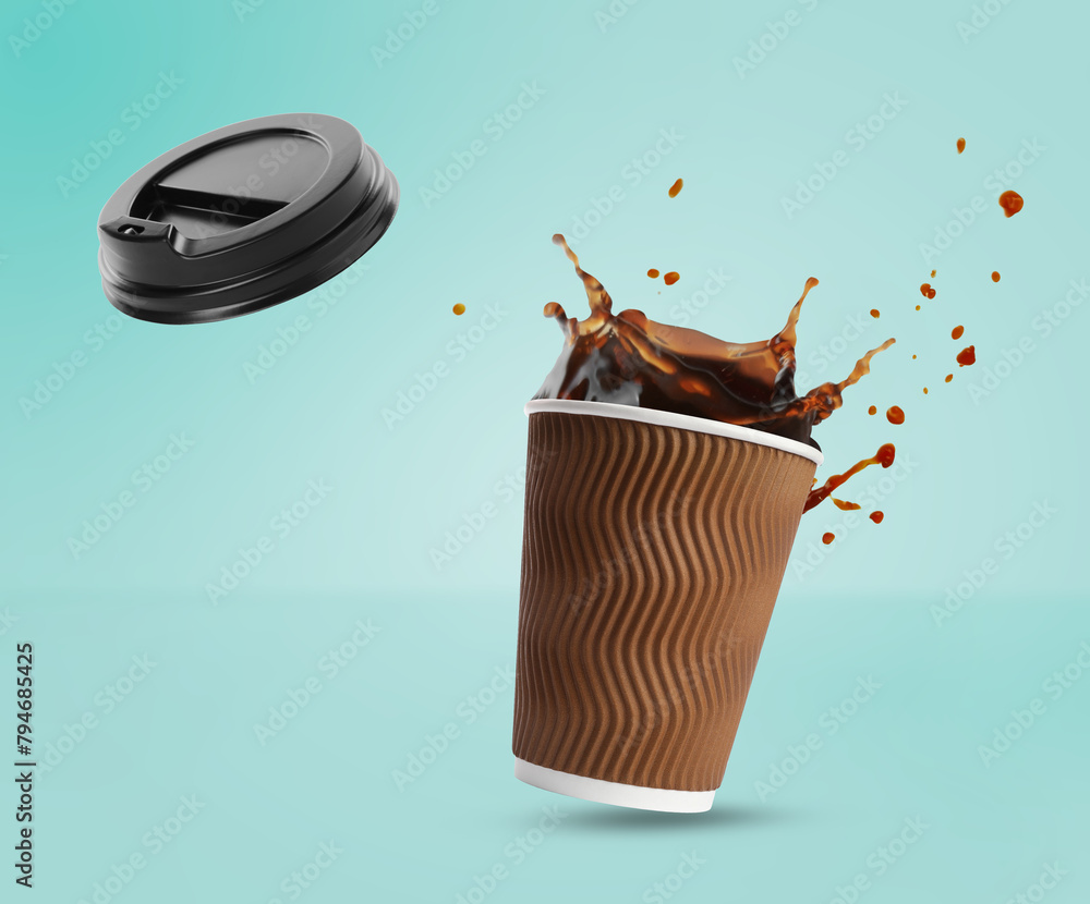 Wall mural Aromatic coffee in takeaway paper cup in air on turquoise background