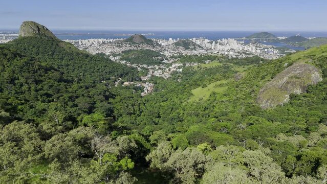 Drone flies from Parque Estadual da Fonte Grande toward the Atlantic Ocean