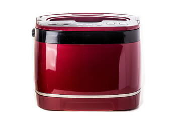 A stylish bread maker adorned with a glossy red exterior and a non-stick bread pan isolated on a solid white background.