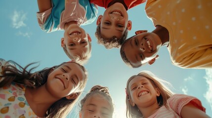 A group portrait of happy, diverse children huddling together outdoors under a clear sky.