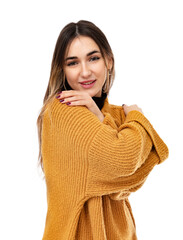 Embrace equity concept in a portrait of friendly young waman , looks with happy expression, isolated on white background. Twenty year old girl hugging herself and posing in studio