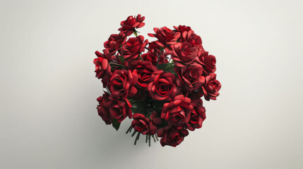 A lush bouquet of vibrant red roses lying on a clean white surface, symbolizing love and affection.