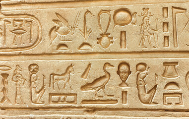Close up of hieroglyphs during the time of the Ptolemy pharoahs on the temple walls in the Temple...